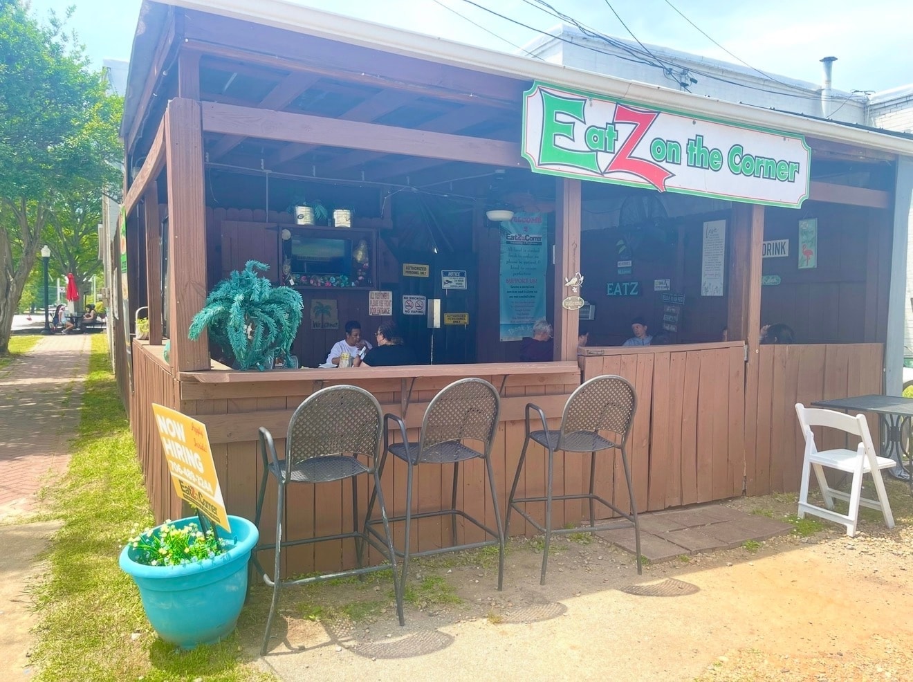 Eatz on the Corner open-air patio with outdoor bar seating