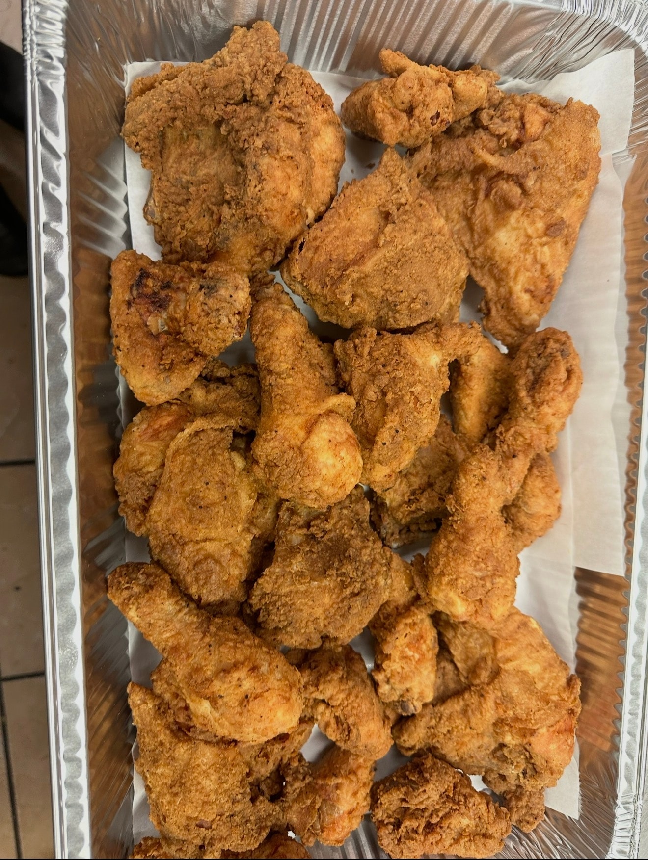 Tray of fried chicken prepared for Eatz Grill catering