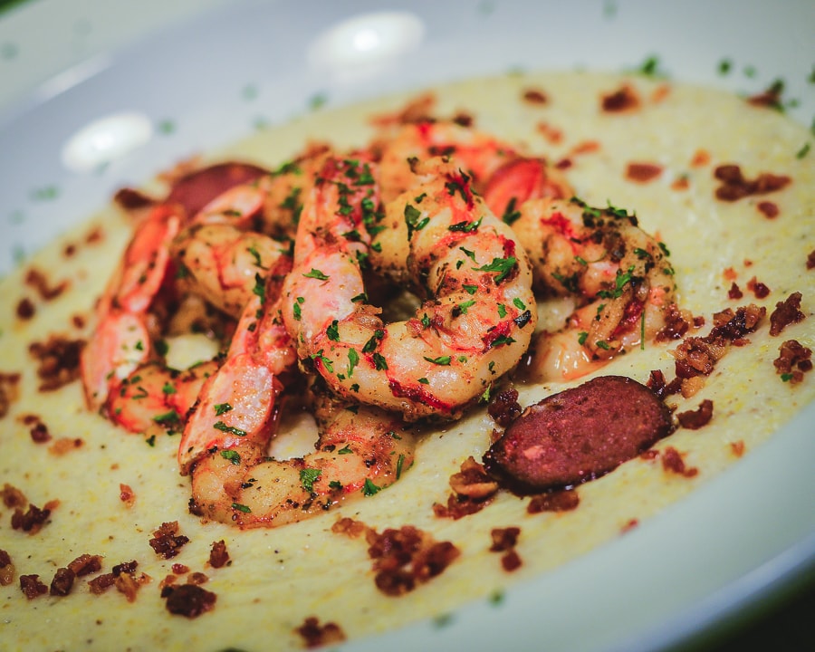 Grilled shrimp served over a Southern-style dish at Eatz Grill